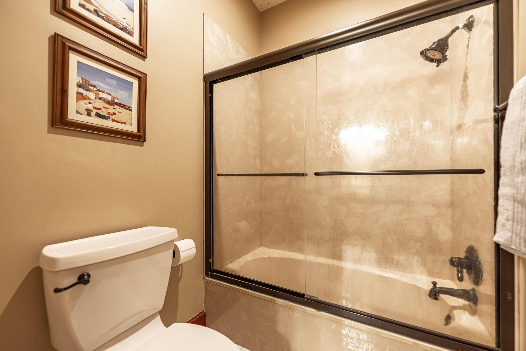 8161 Killarney Aire Road Roscoe, IL 61073 - Photo 29 of 53 a bathroom with a shower and a toilet