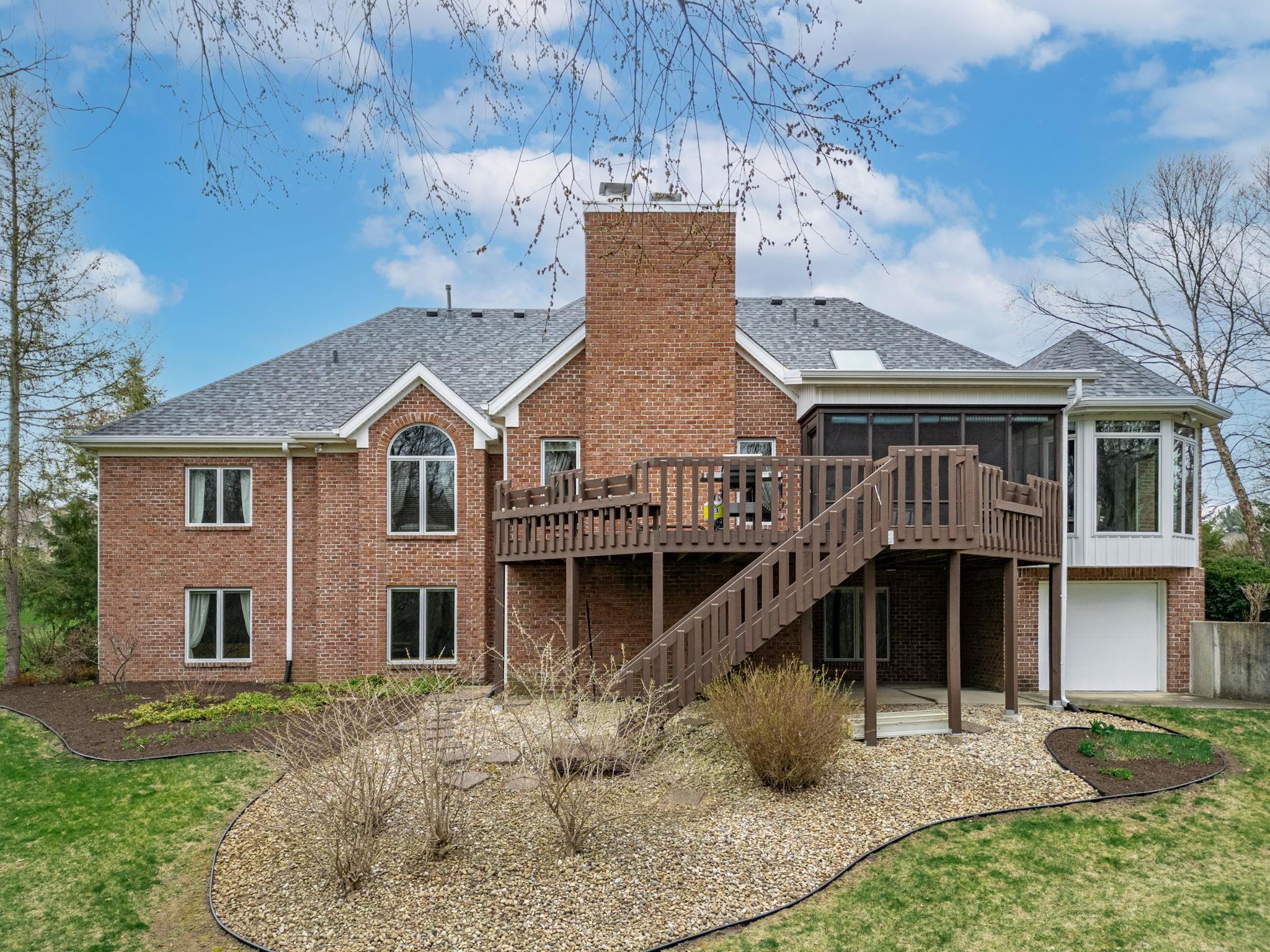 8161 Killarney Aire Road Roscoe, IL 61073 - Photo 40 of 53 front view of a house with a yard