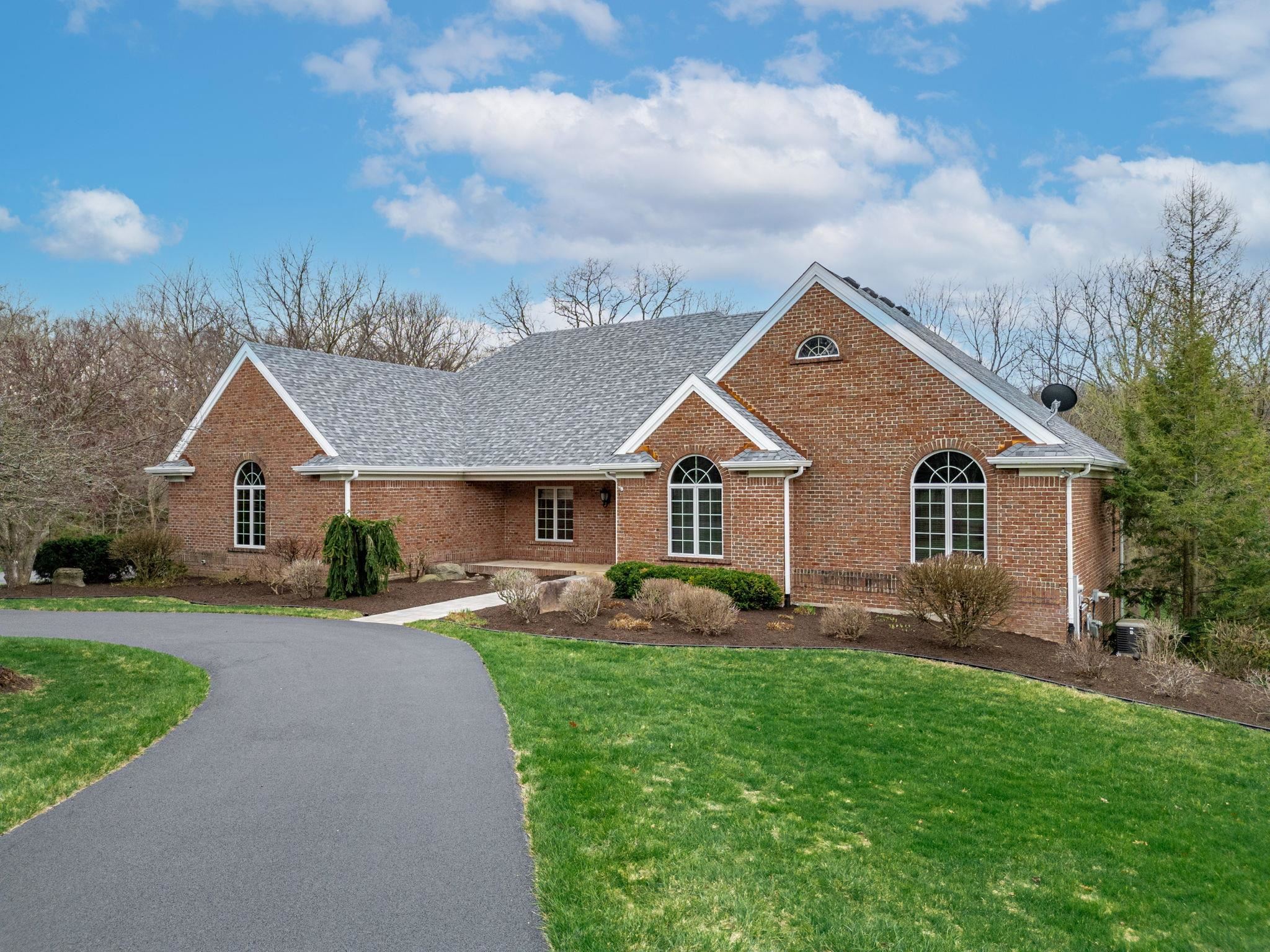 8161 Killarney Aire Road Roscoe, IL 61073 - Photo 4 of 53 a front view of house with yard and green space