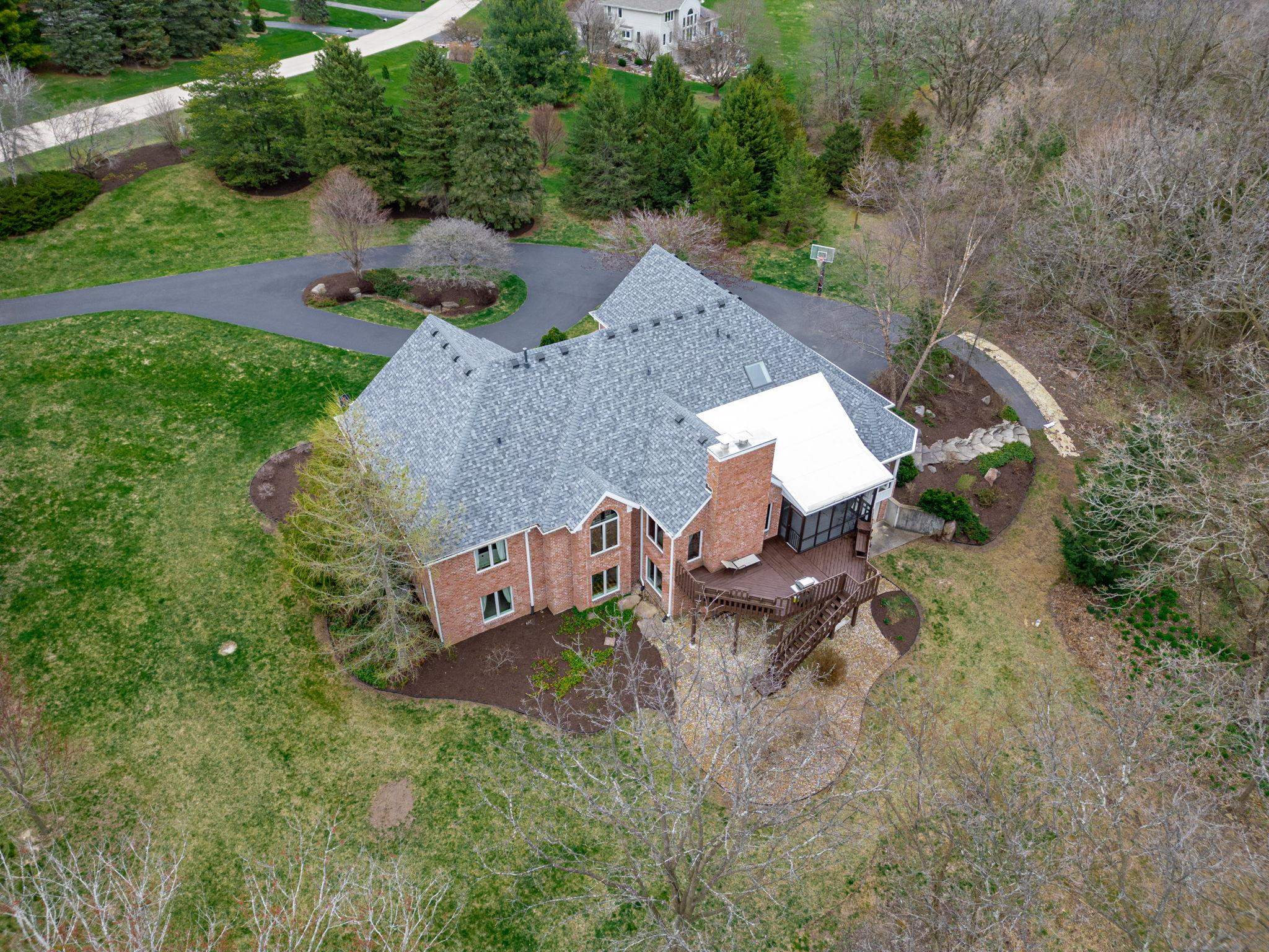8161 Killarney Aire Road Roscoe, IL 61073 - Photo 42 of 53 an aerial view of a house with garden space and street view