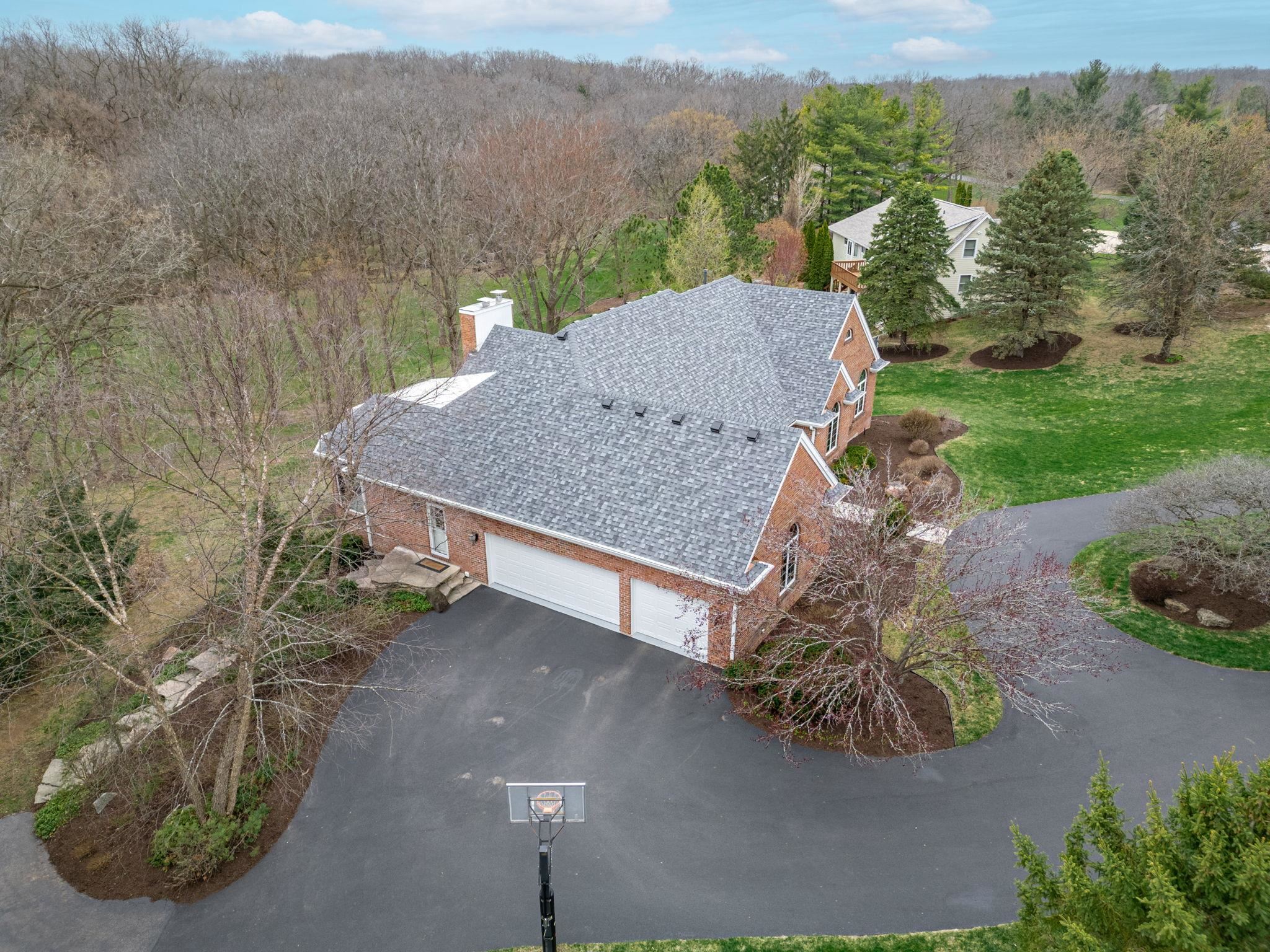 8161 Killarney Aire Road Roscoe, IL 61073 - Photo 44 of 53 a view of a house with a yard and mountain
