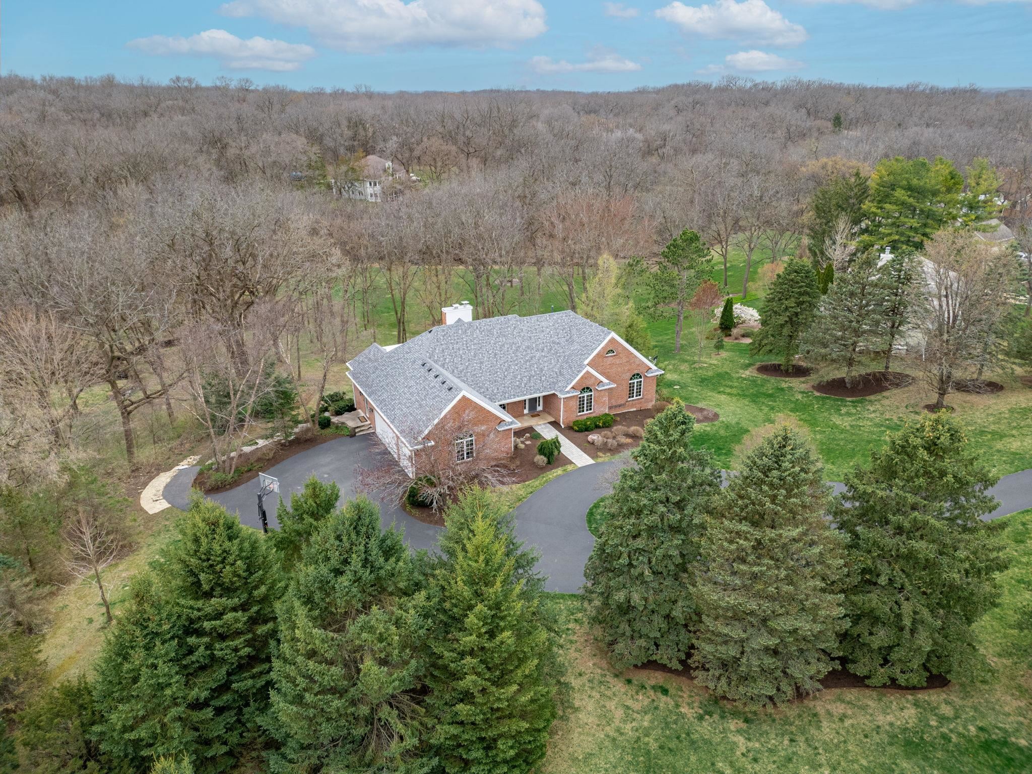 8161 Killarney Aire Road Roscoe, IL 61073 - Photo 45 of 53 an aerial view of a house with yard and outdoor seating