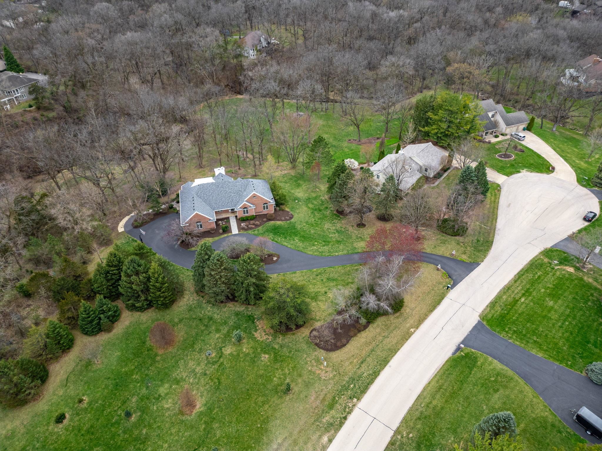 8161 Killarney Aire Road Roscoe, IL 61073 - Photo 50 of 53 a backyard of a house with a yard and outdoor seating