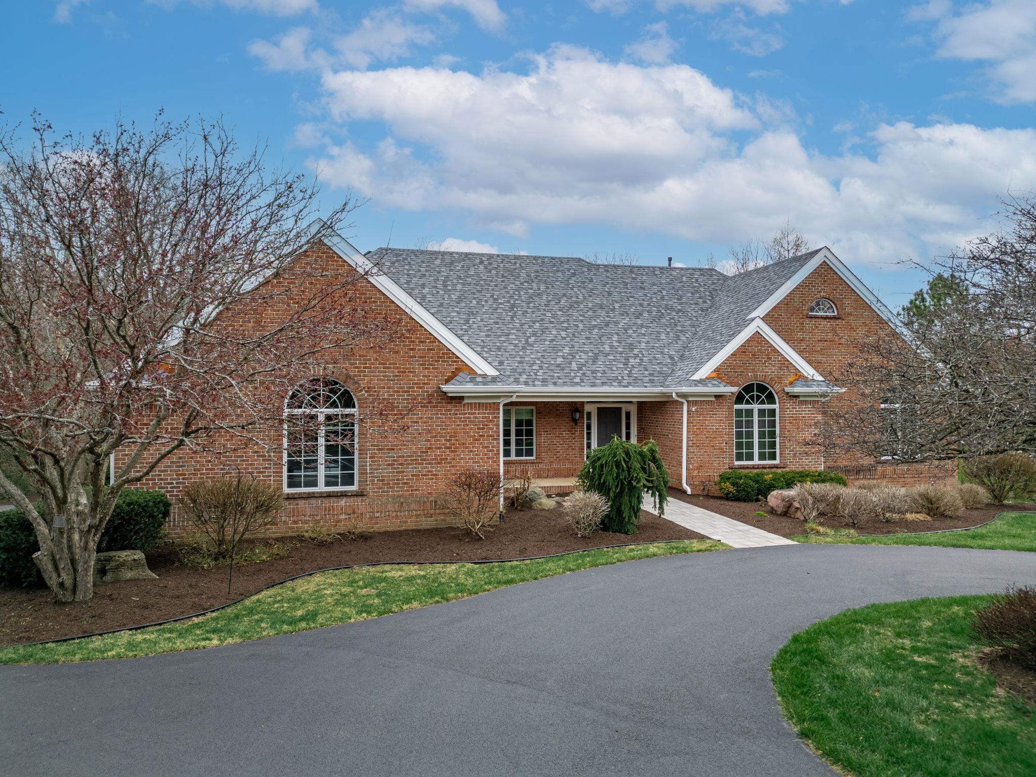 8161 Killarney Aire Road Roscoe, IL 61073 - Photo 5 of 53 front view of house with a yard