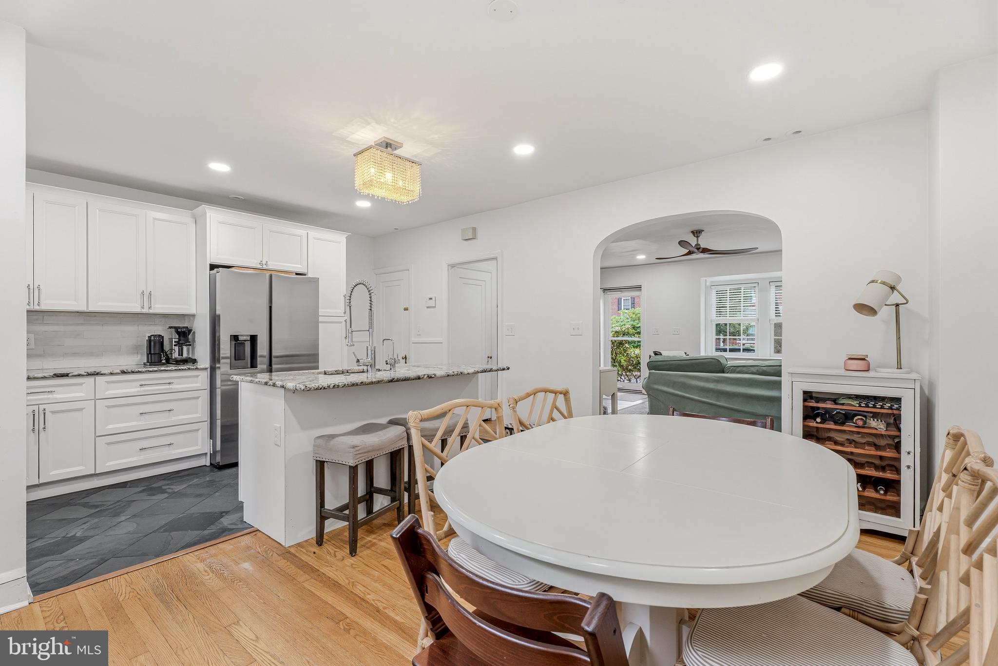 314 Murdock Road Baltimore, MD 21212 - Photo 8 of 42 a large kitchen with a table and chairs