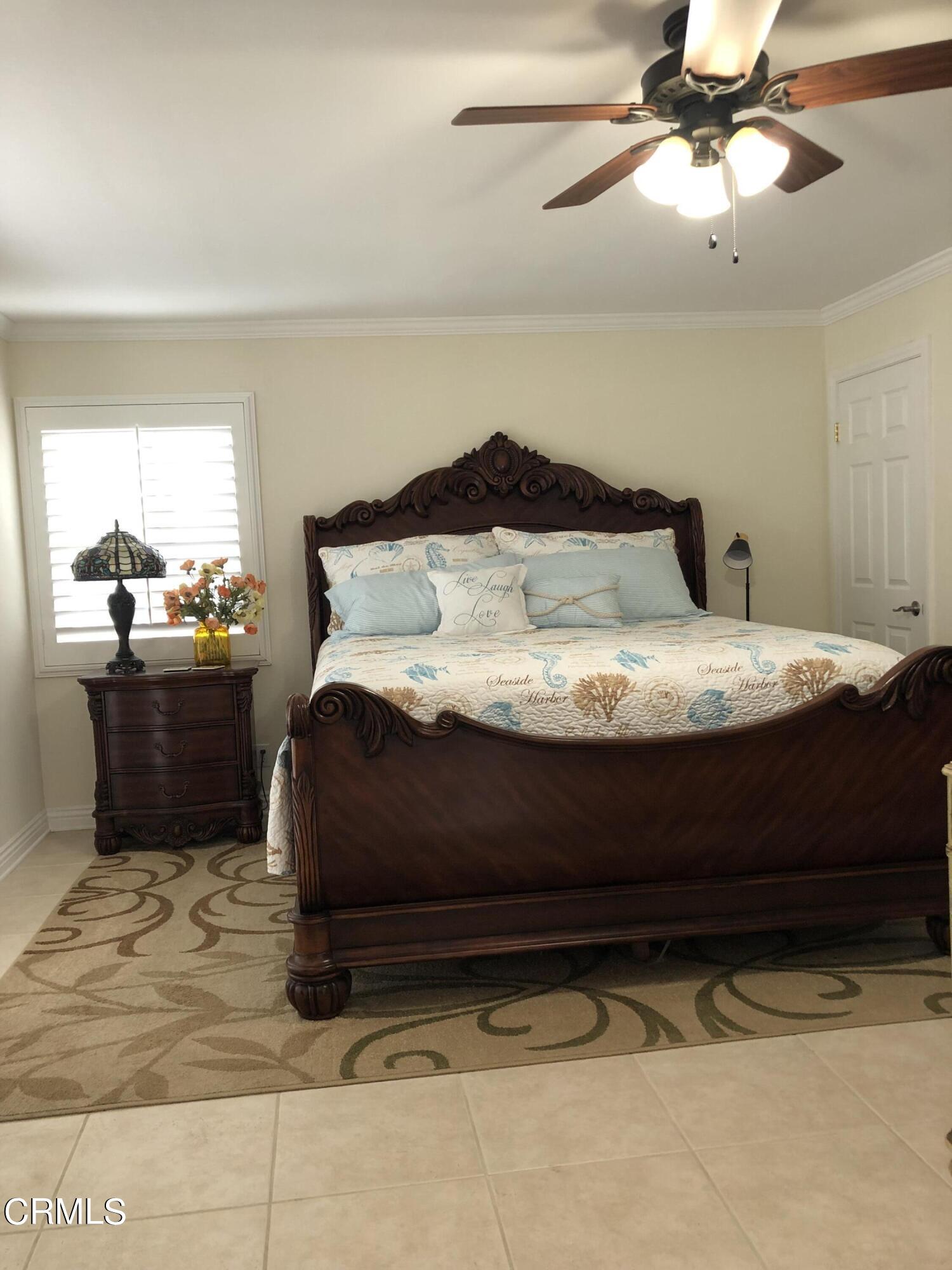 4962 Nautilus Street, Unit 1 Oxnard, CA 93035 - Photo 14 of 18 a bedroom with a bed dresser and a window