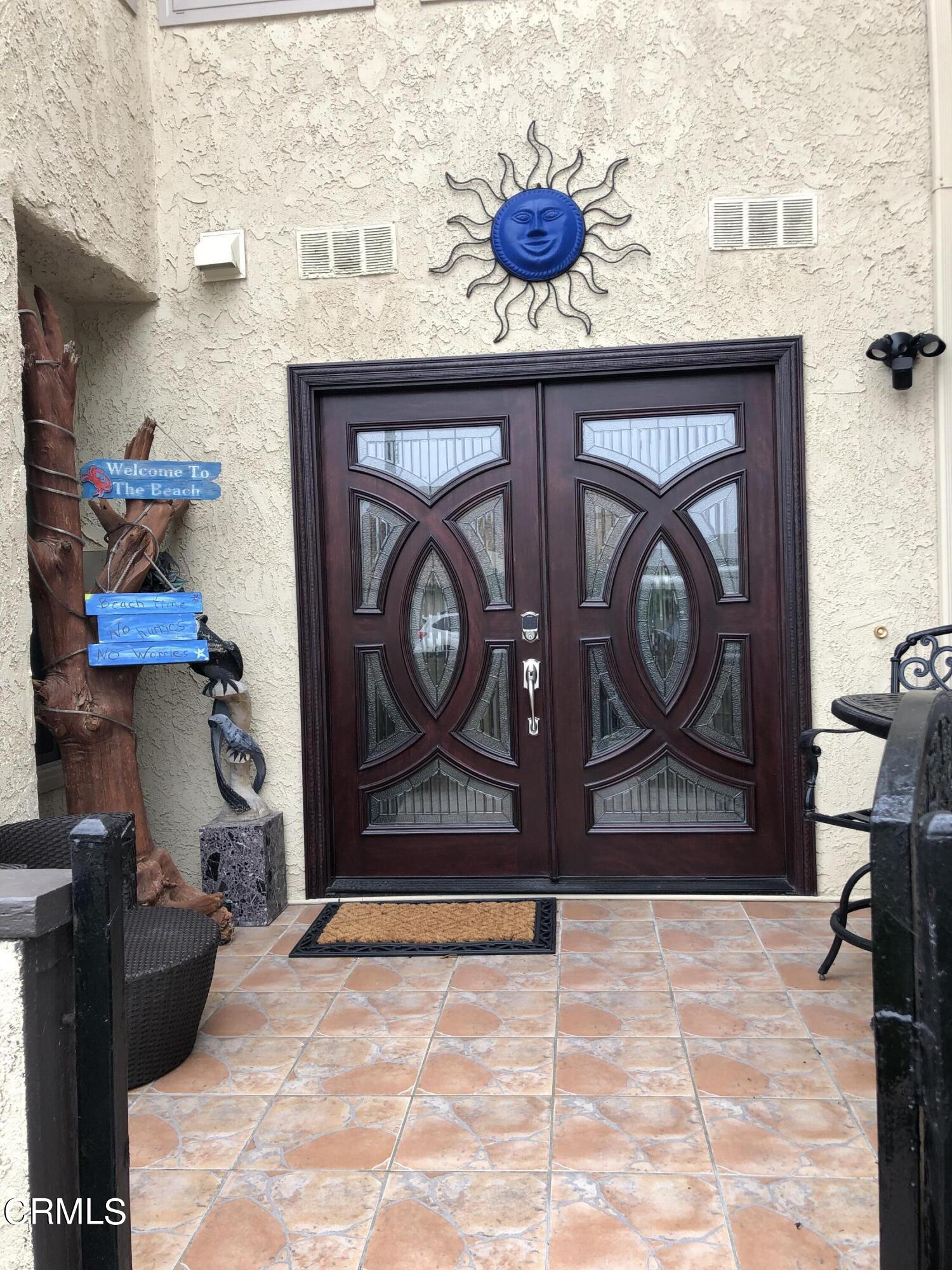4962 Nautilus Street, Unit 1 Oxnard, CA 93035 - Photo 2 of 18 a view of entryway front of a house