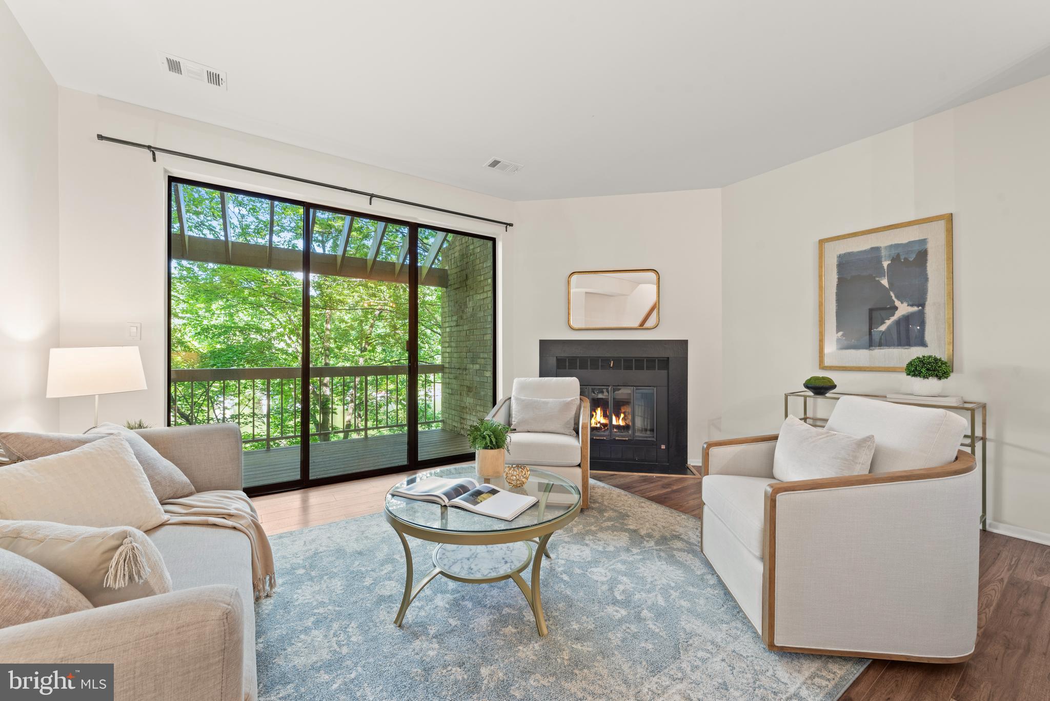 11116 Boathouse Court, Unit 93 Reston, VA 20191 - Photo 14 of 34 a living room with furniture and a fireplace