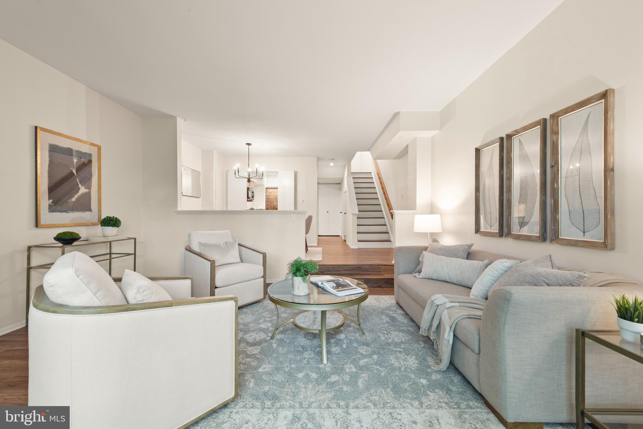 11116 Boathouse Court, Unit 93 Reston, VA 20191 - Photo 16 of 34 a living room with furniture and a large window