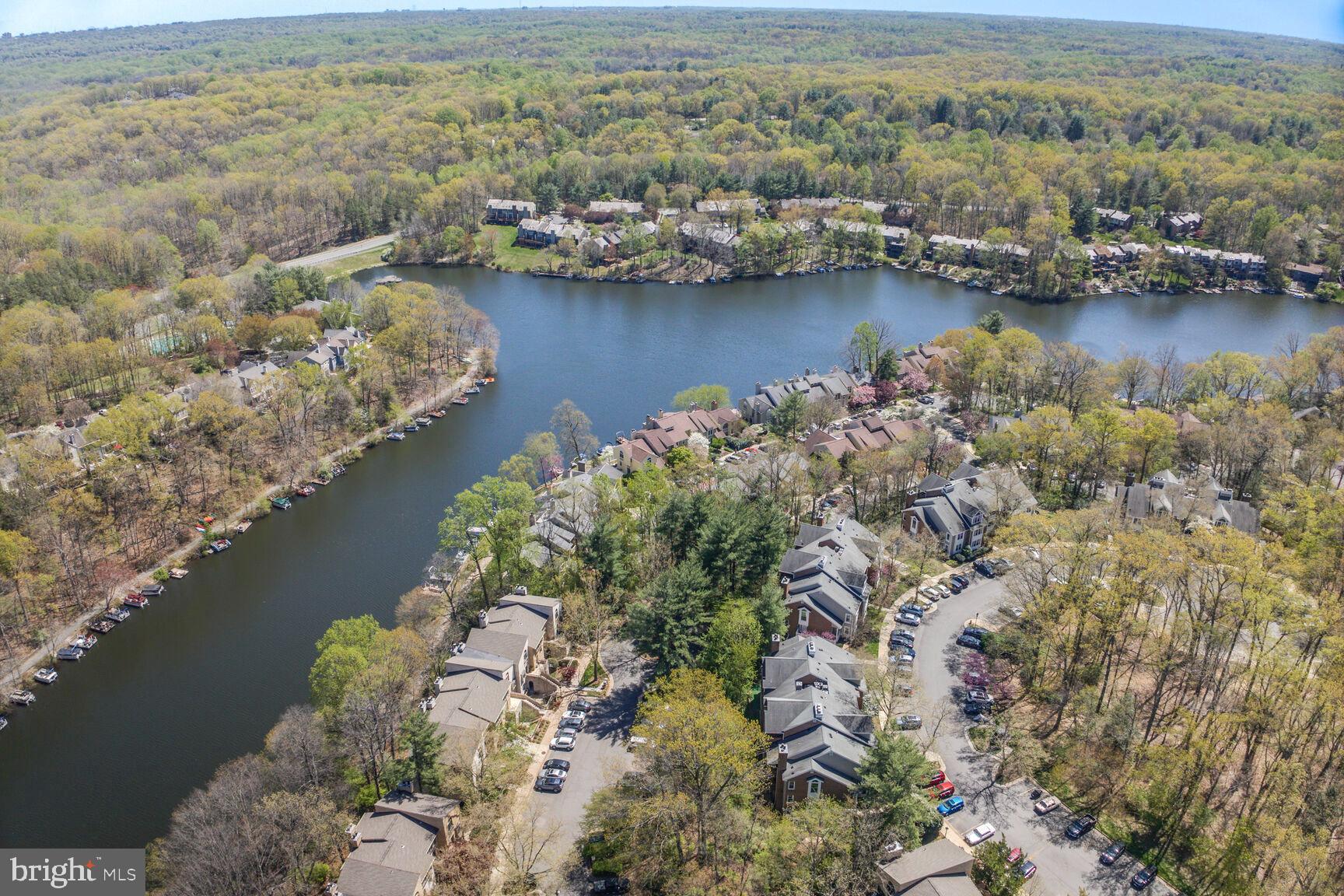 11116 Boathouse Court, Unit 93 Reston, VA 20191 - Photo 27 of 34 an aerial view of a house with a lake view