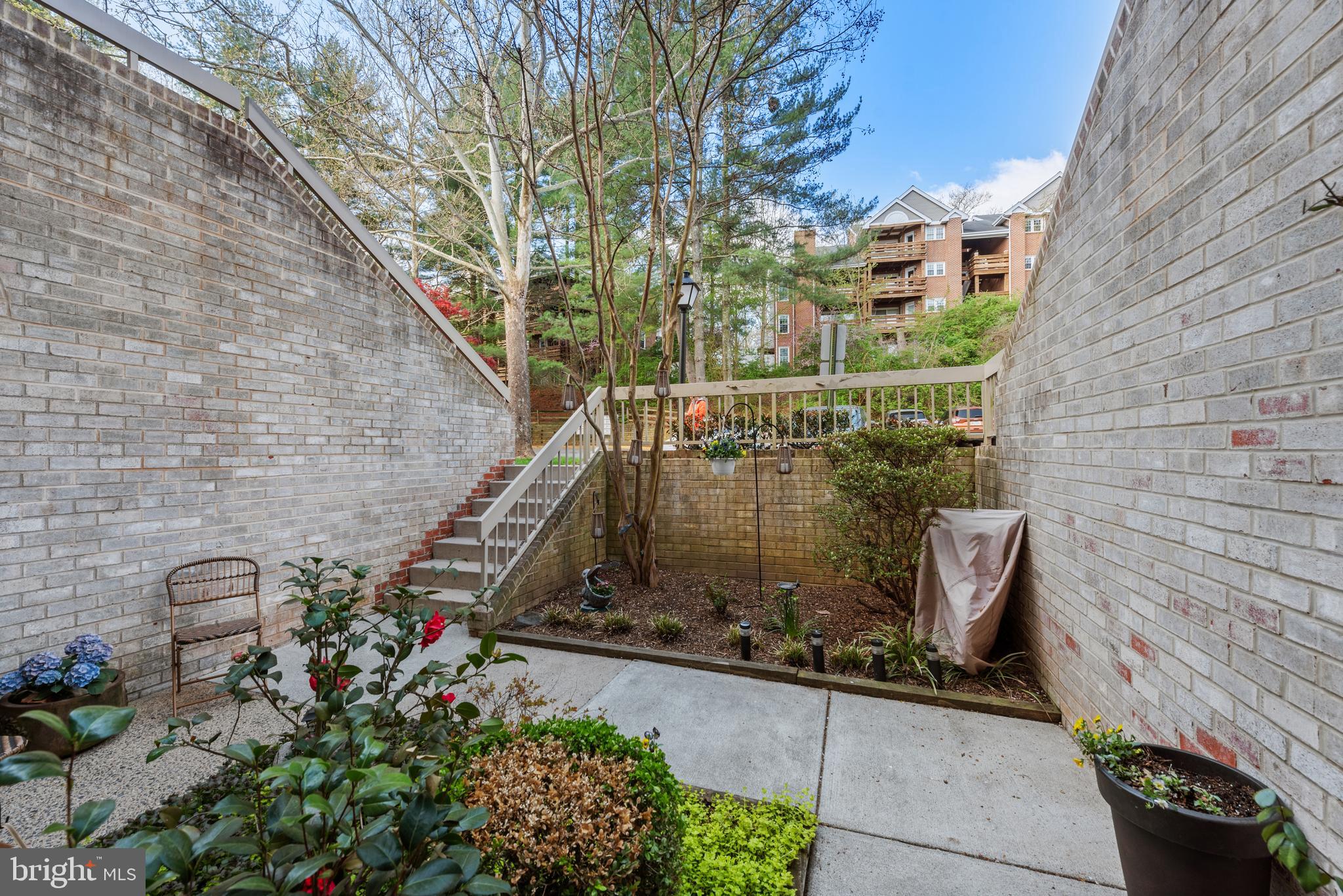 11116 Boathouse Court, Unit 93 Reston, VA 20191 - Photo 4 of 34 a view of outdoor space and garden