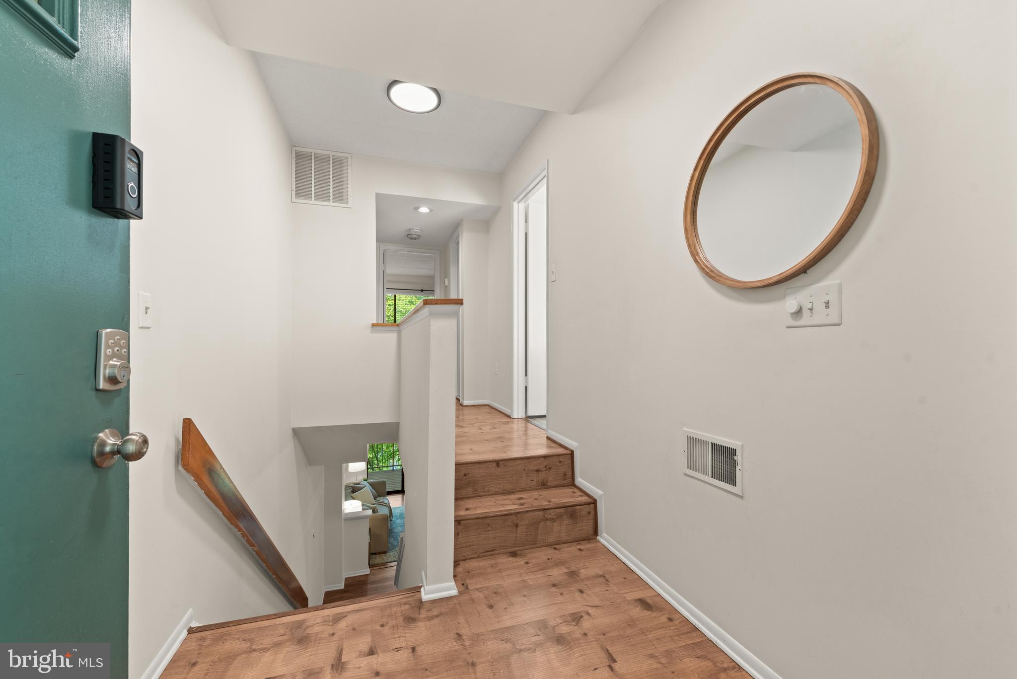 11116 Boathouse Court, Unit 93 Reston, VA 20191 - Photo 5 of 34 wooden floor in an empty room