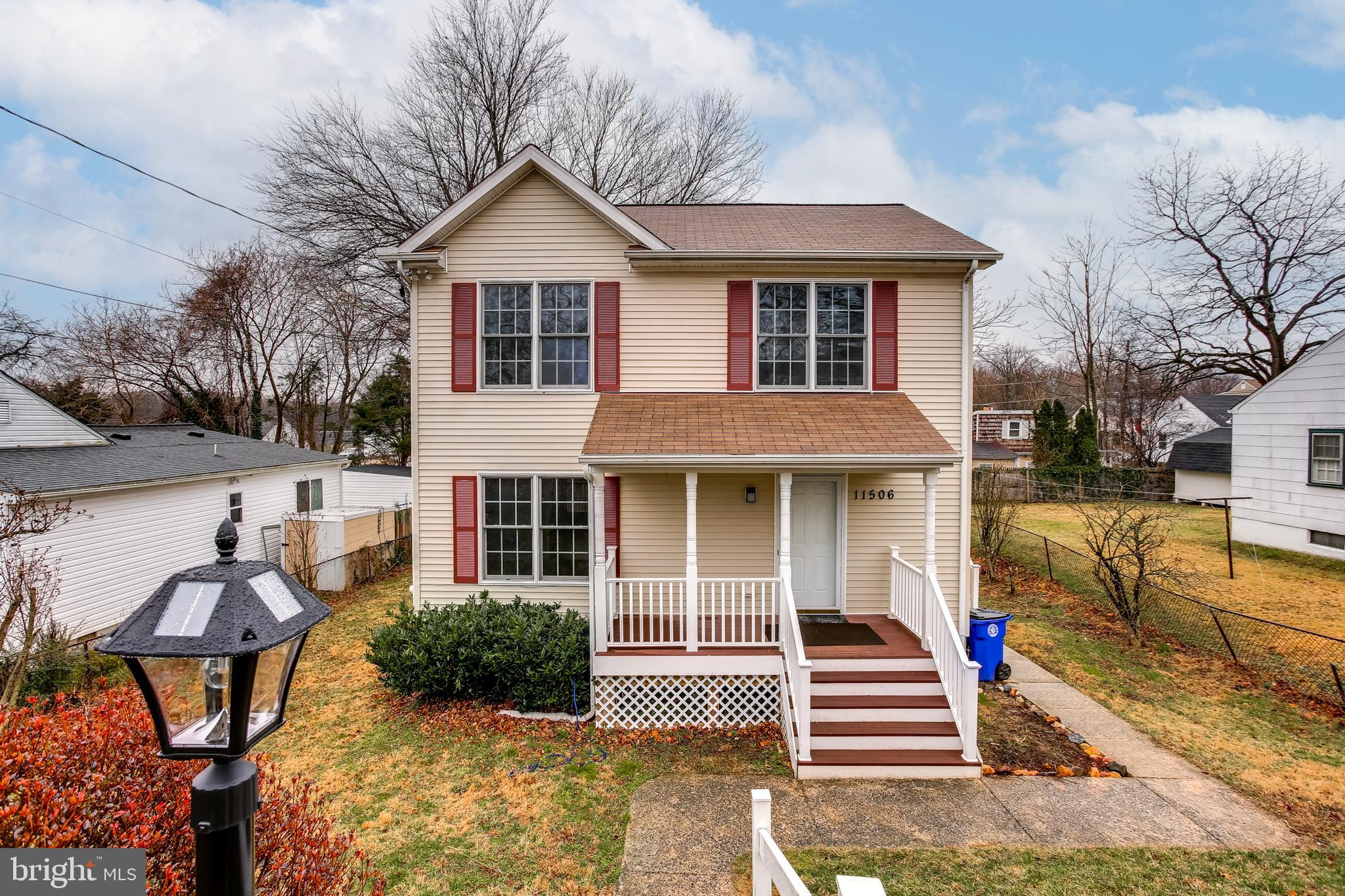 11506 Joseph Mill Road Silver Spring, MD 20906 - Photo 1 of 29 a front view of a house with a yard