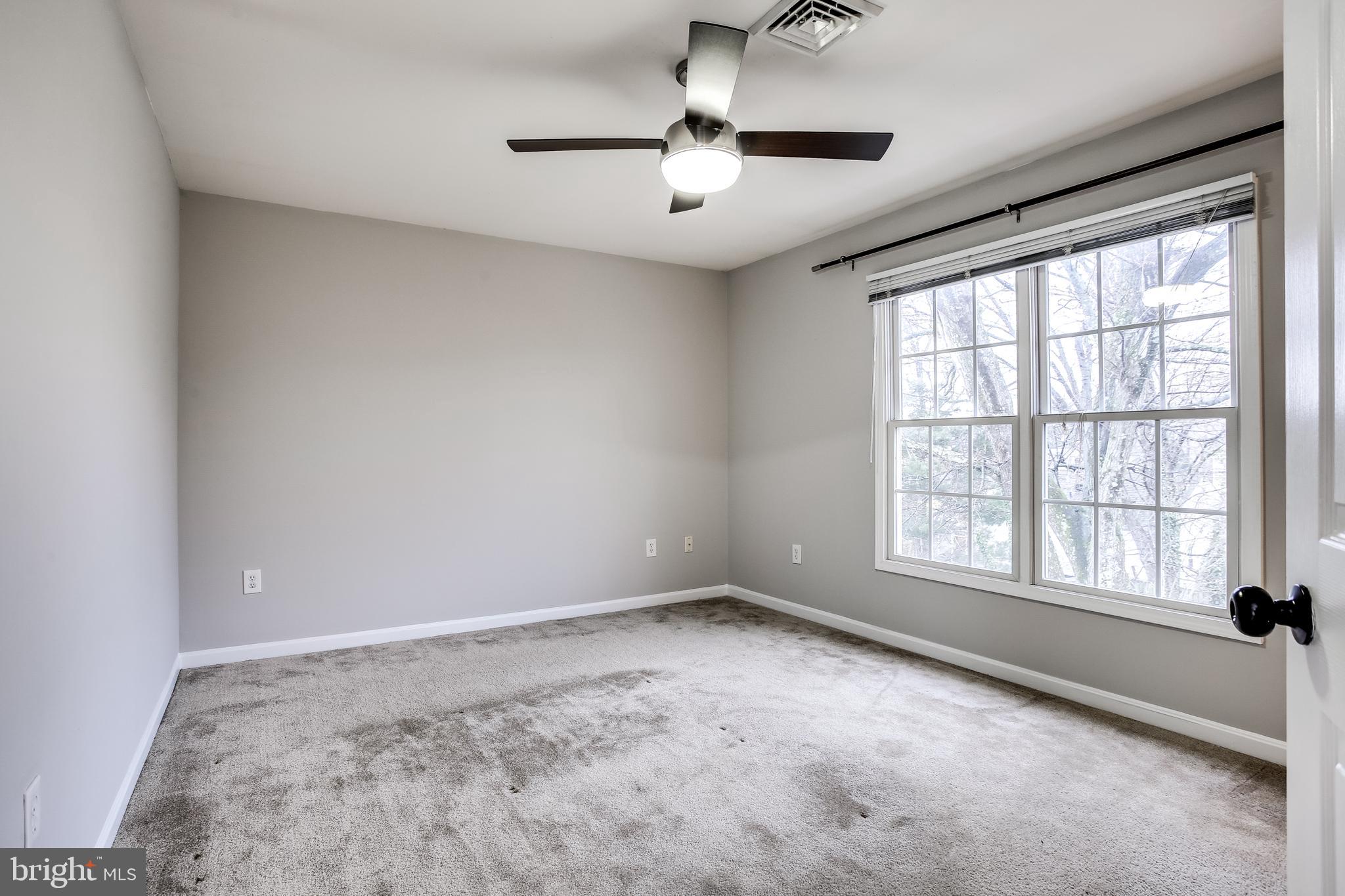 11506 Joseph Mill Road Silver Spring, MD 20906 - Photo 16 of 29 a view of an empty room with a window