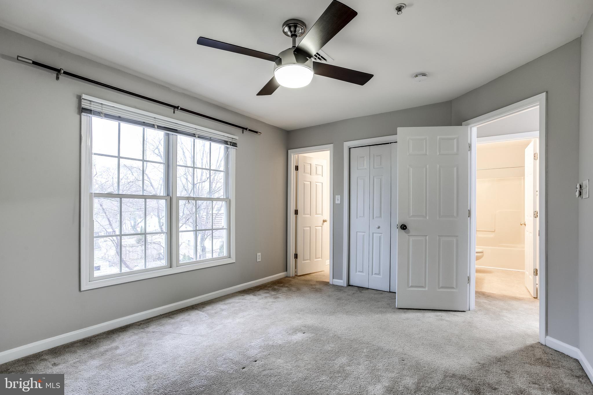 11506 Joseph Mill Road Silver Spring, MD 20906 - Photo 17 of 29 a view of an empty room with a window