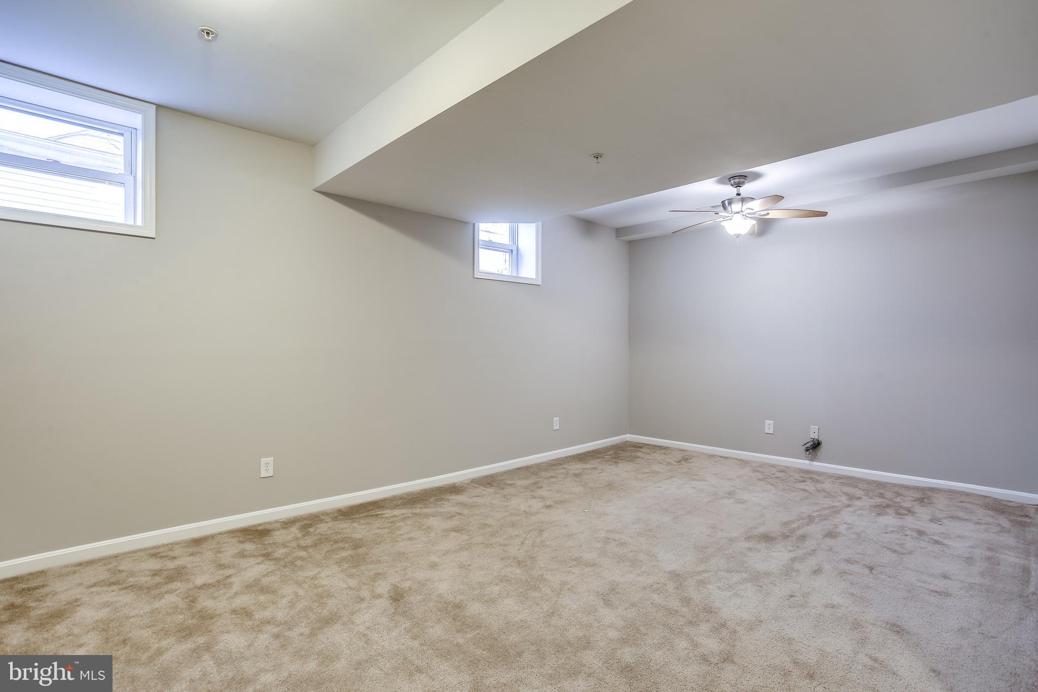 11506 Joseph Mill Road Silver Spring, MD 20906 - Photo 21 of 29 an empty room with a window