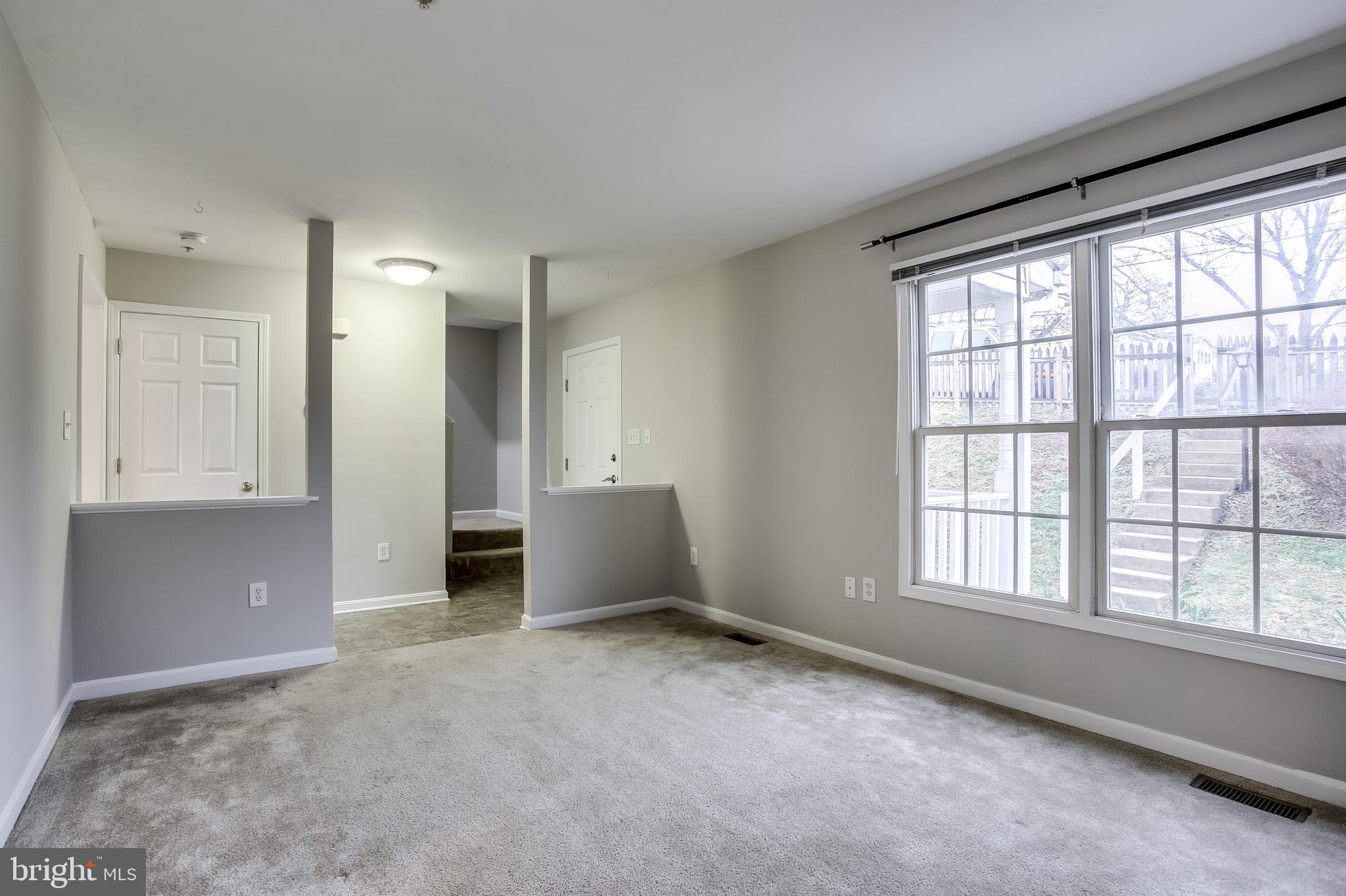11506 Joseph Mill Road Silver Spring, MD 20906 - Photo 10 of 29 an empty room with windows and closet
