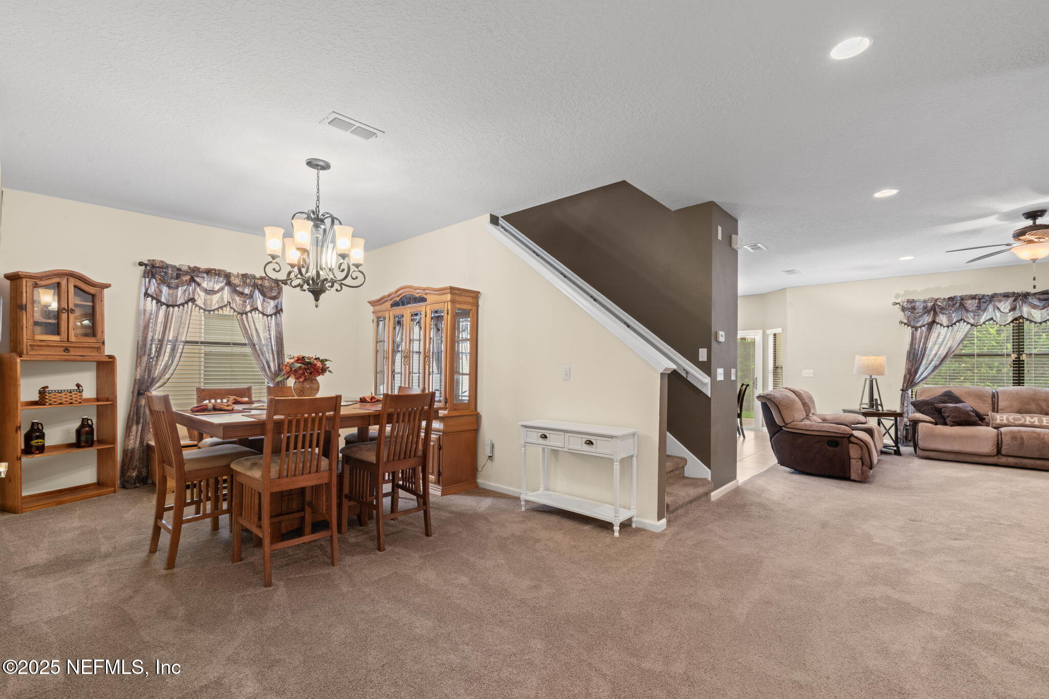 203 Buck Run Way St. Augustine, FL 32092 - Photo 13 of 62 a view of a dining room with furniture