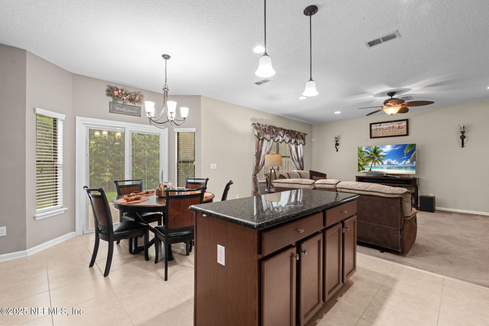 203 Buck Run Way St. Augustine, FL 32092 - Photo 25 of 62 a view of a dining room with furniture window and outside view