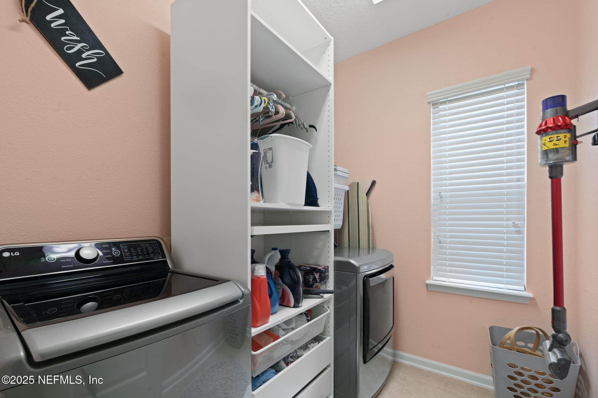 203 Buck Run Way St. Augustine, FL 32092 - Photo 27 of 62 a view of walk in closet with clothes and shoes