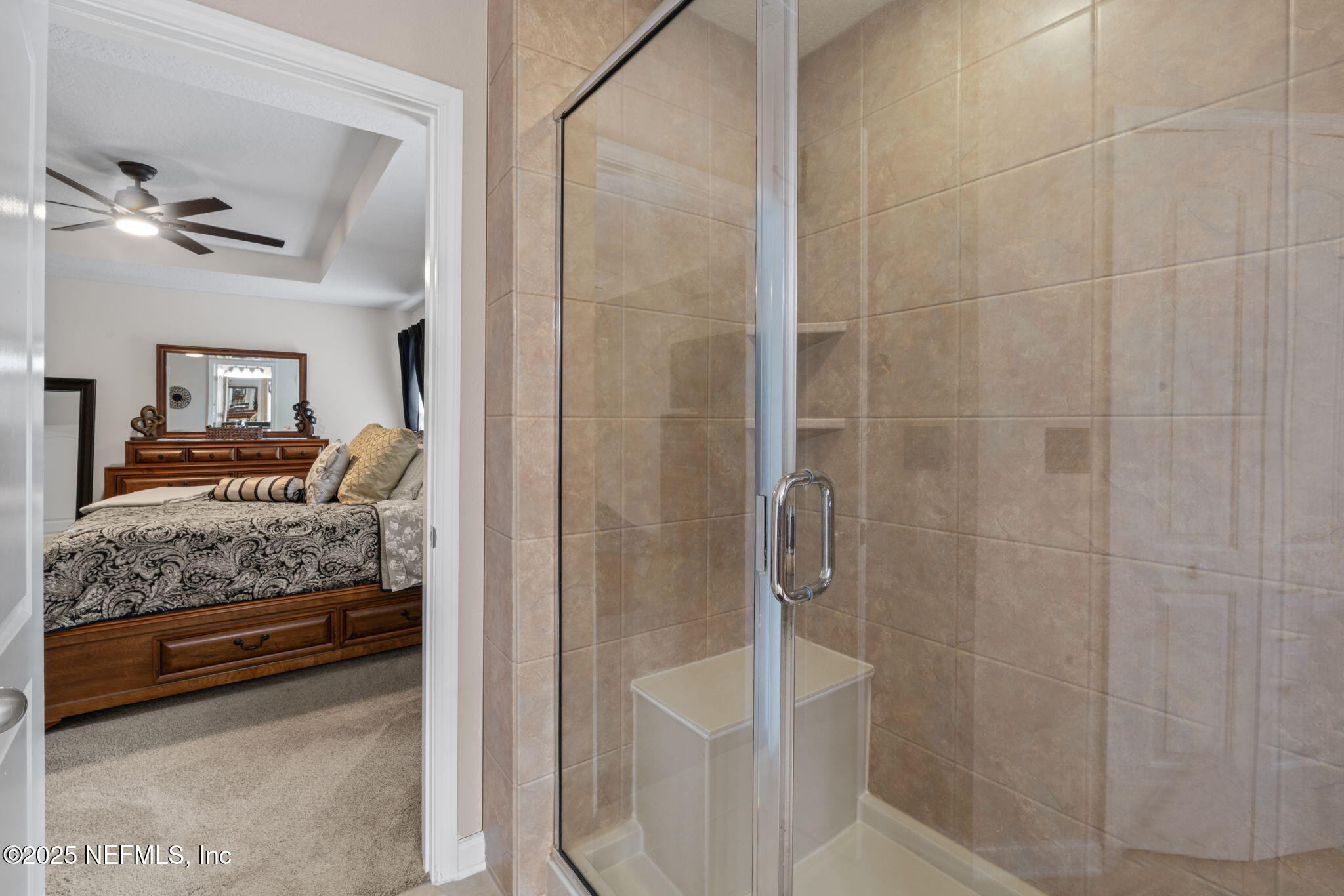 203 Buck Run Way St. Augustine, FL 32092 - Photo 32 of 62 a en suite bathroom with a sink and a shower