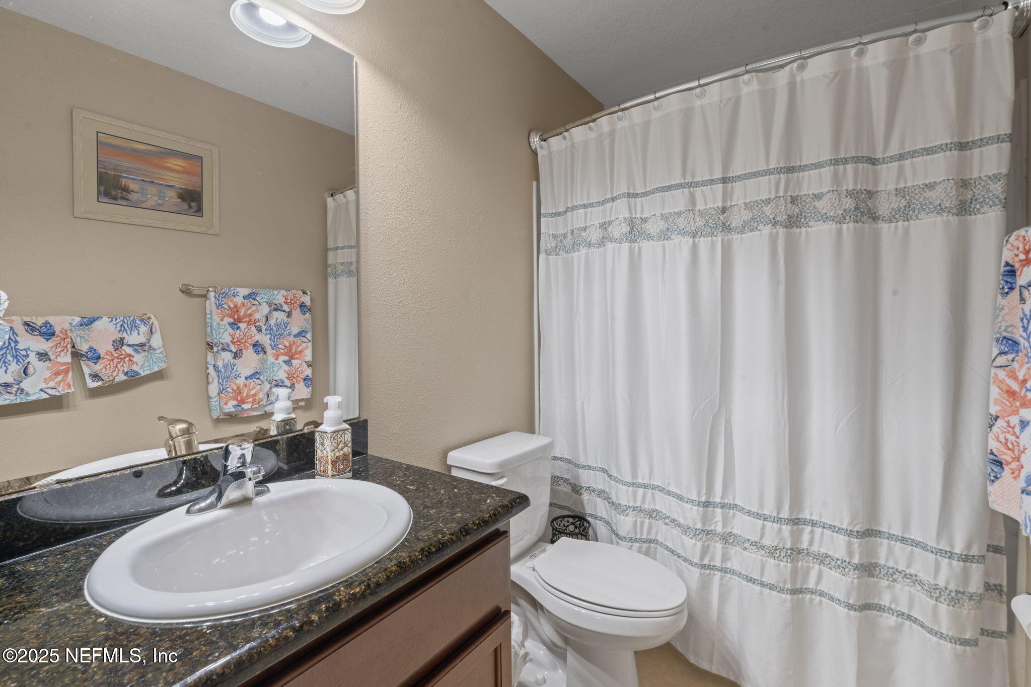 203 Buck Run Way St. Augustine, FL 32092 - Photo 33 of 62 a bathroom with a sink toilet and a mirror