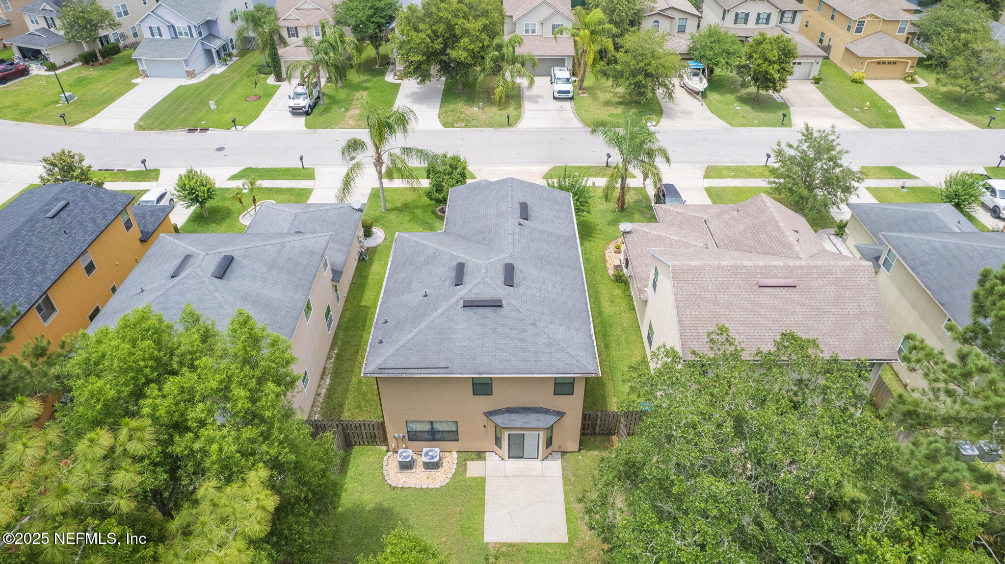 203 Buck Run Way St. Augustine, FL 32092 - Photo 50 of 62 an aerial view of a house with a garden and a yard