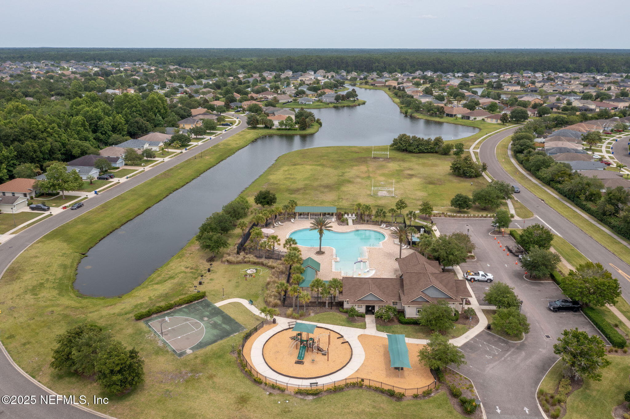 203 Buck Run Way St. Augustine, FL 32092 - Photo 54 of 62 an aerial view of a house with swimming pool and ocean view
