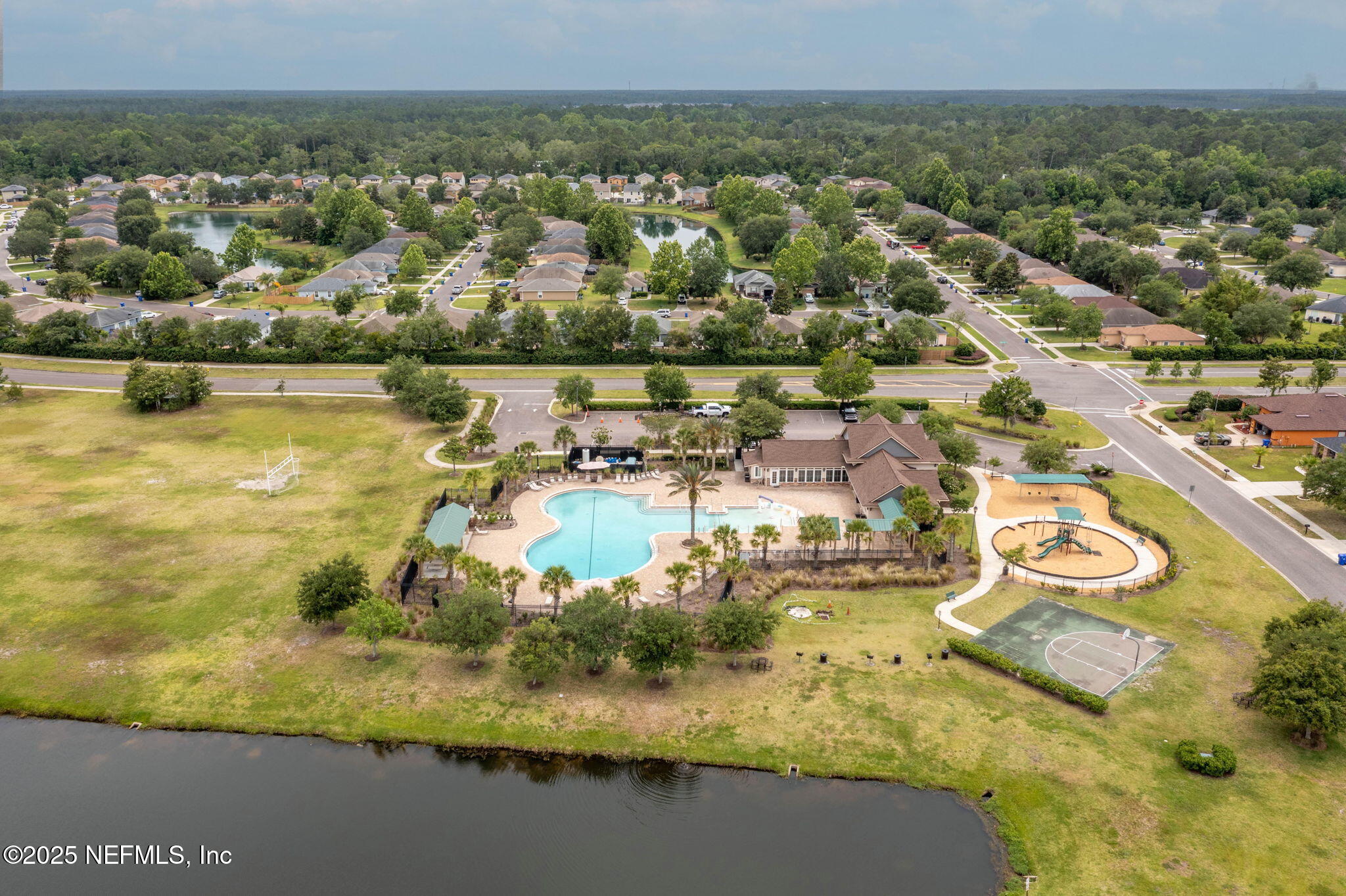 203 Buck Run Way St. Augustine, FL 32092 - Photo 56 of 62 an aerial view of residential houses with outdoor space