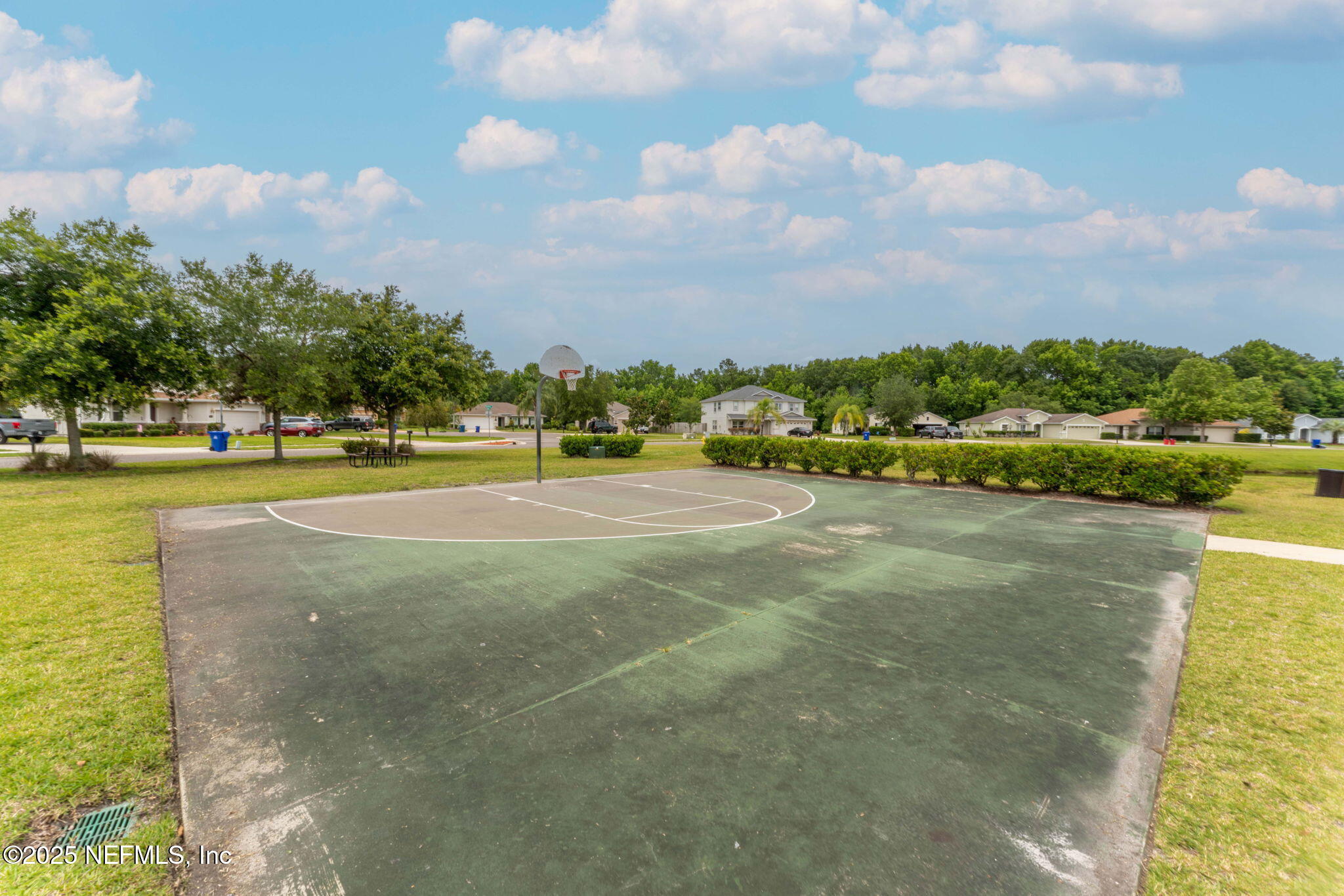 203 Buck Run Way St. Augustine, FL 32092 - Photo 58 of 62 a view of a lake with houses in the back