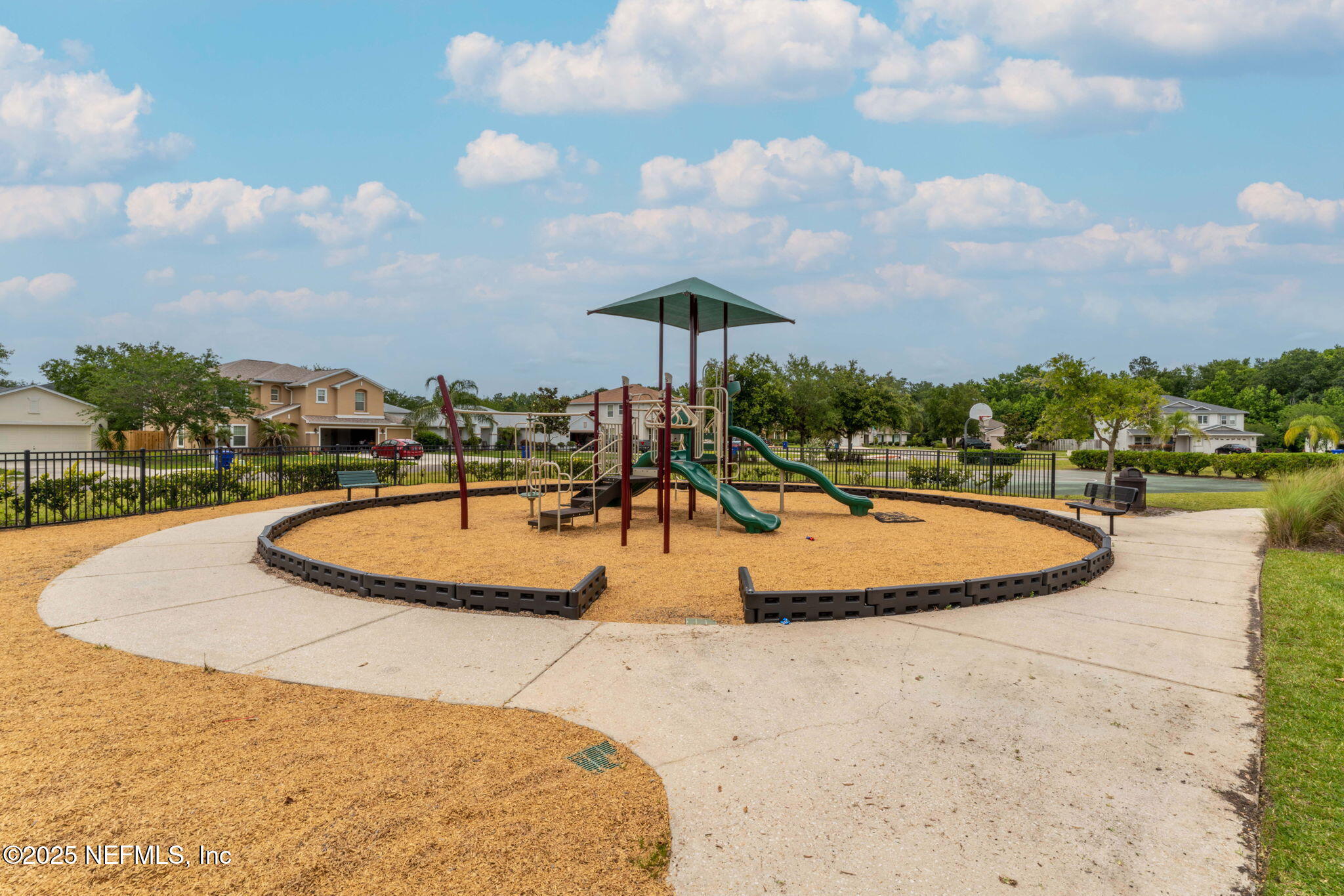 203 Buck Run Way St. Augustine, FL 32092 - Photo 59 of 62 a view of a swimming pool with a yard