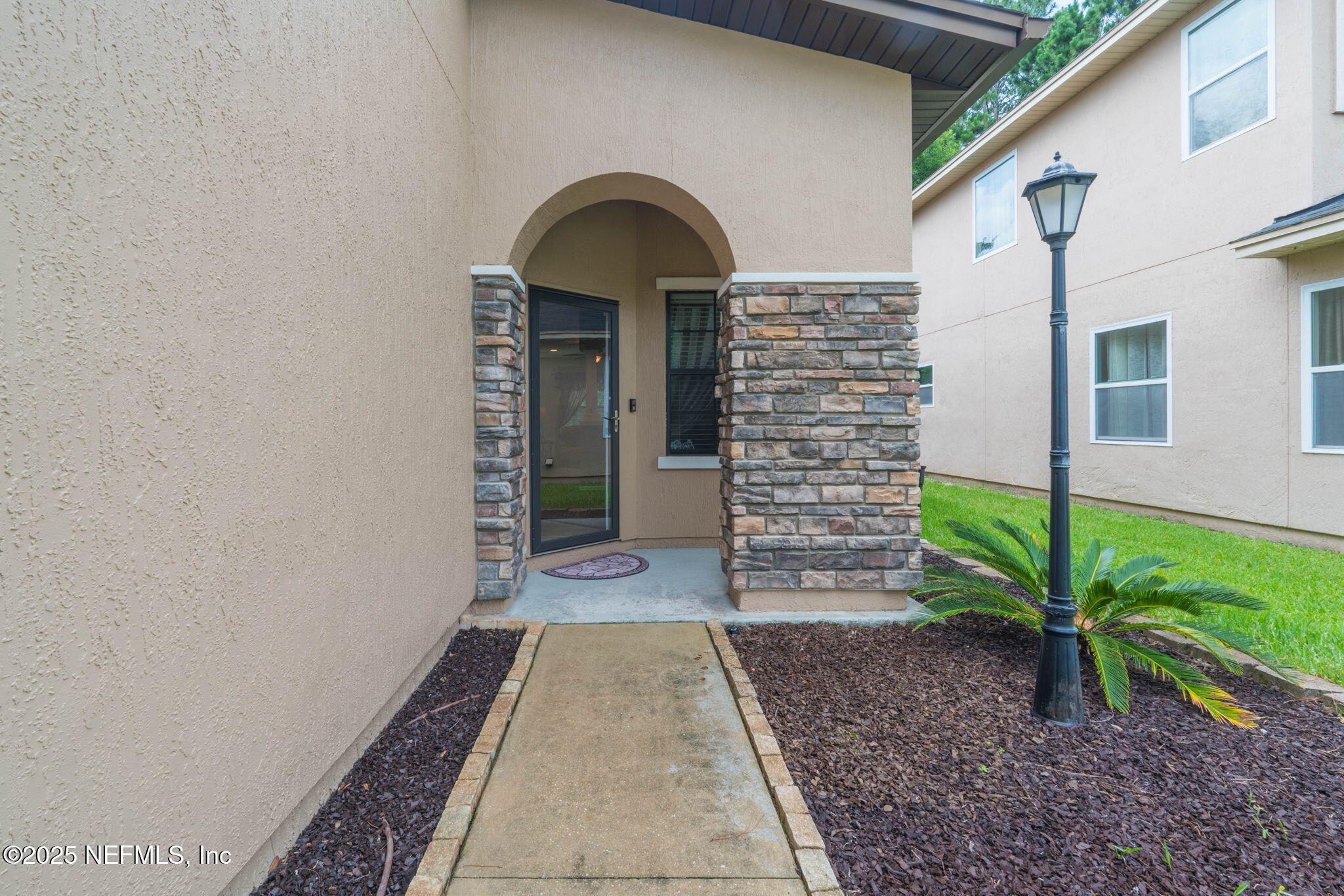 203 Buck Run Way St. Augustine, FL 32092 - Photo 6 of 62 a view of front door of house
