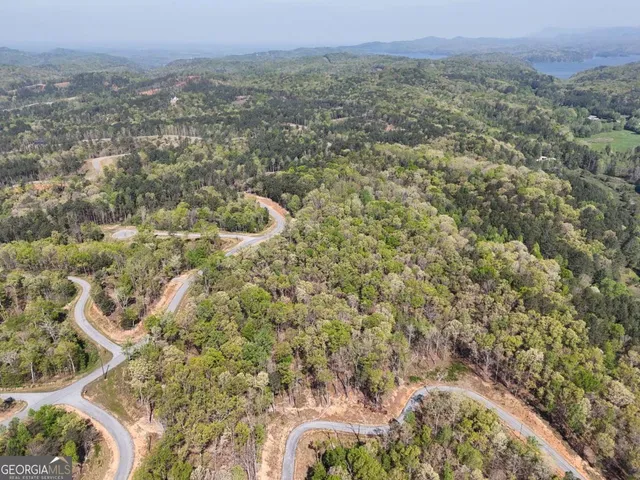 an aerial view of residential house with parking space
