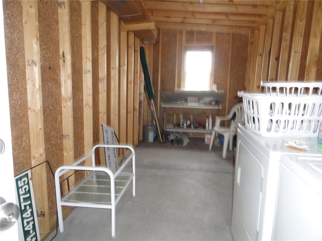 6233 Parakeet Road Englewood, FL 34224 - Photo 27 of 27 a living room with furniture and a window