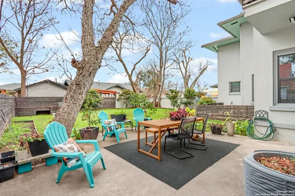 a outdoor space with furniture and a fireplace