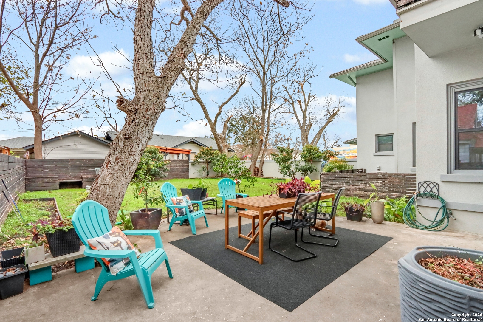 503 South Austin Street Seguin, TX 78155 - Photo 14 of 40 a outdoor space with furniture and a fireplace