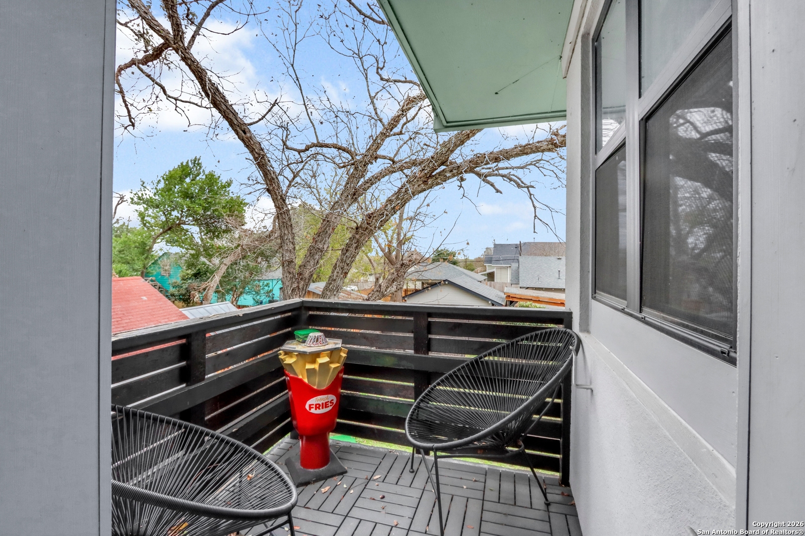 503 South Austin Street Seguin, TX 78155 - Photo 38 of 40 a backyard of a house with wooden floor and outdoor seating