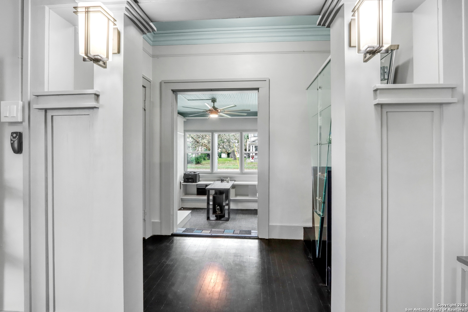 503 South Austin Street Seguin, TX 78155 - Photo 7 of 40 a view of a hallway with wooden floor and dining room view
