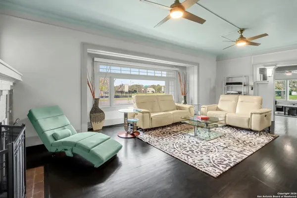 a living room with furniture and a table