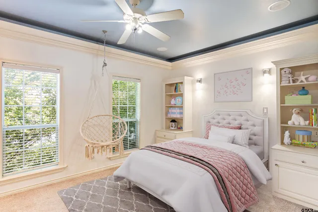 a spacious bedroom with a large bed and a window