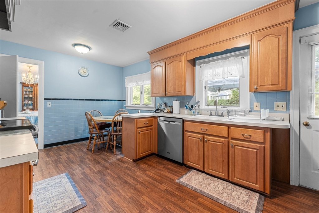 8 Mary Mt Road Auburndale, MA 02466 - Photo 15 of 36 a kitchen with sink cabinets and wooden floor