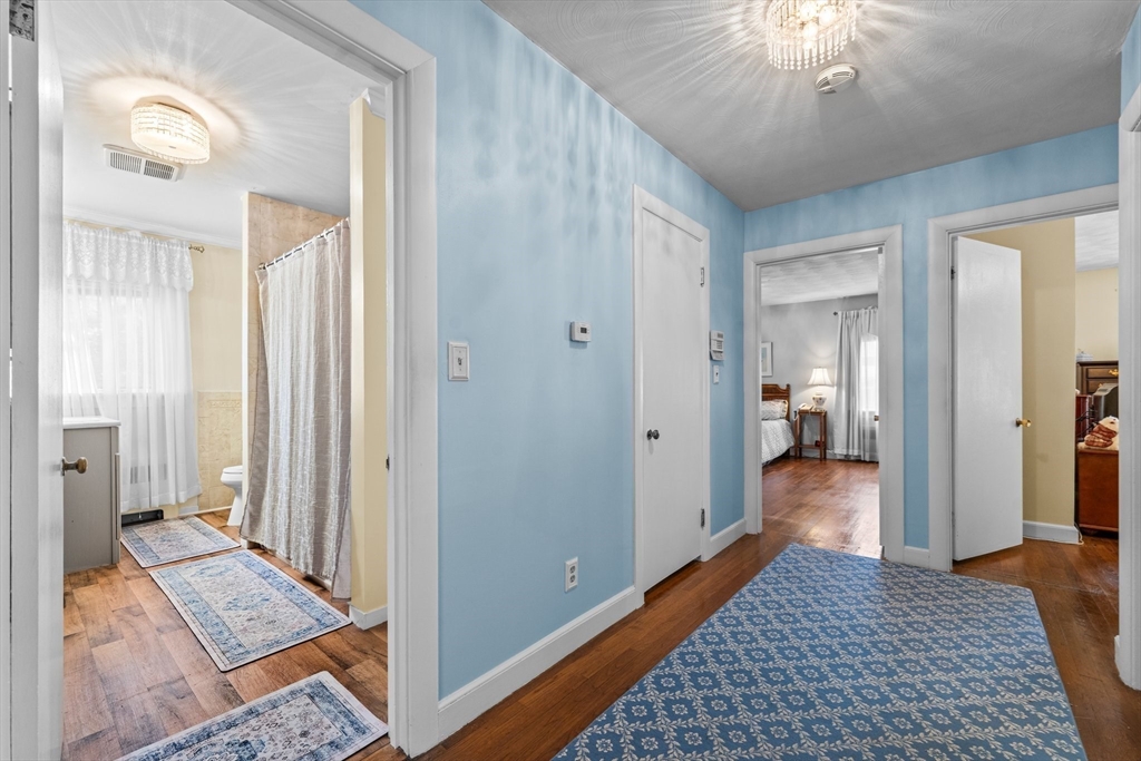 8 Mary Mt Road Auburndale, MA 02466 - Photo 19 of 36 a view of a hallway with a livingroom and a bedroom