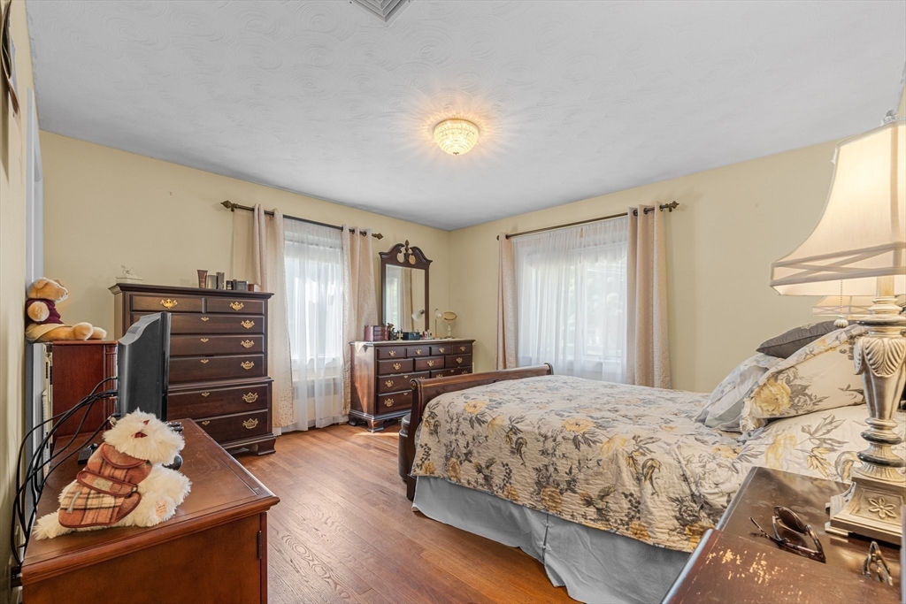 8 Mary Mt Road Auburndale, MA 02466 - Photo 24 of 36 a bedroom with a bed and furniture