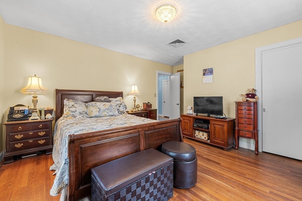 8 Mary Mt Road Auburndale, MA 02466 - Photo 25 of 36 a bedroom with a bed and furniture
