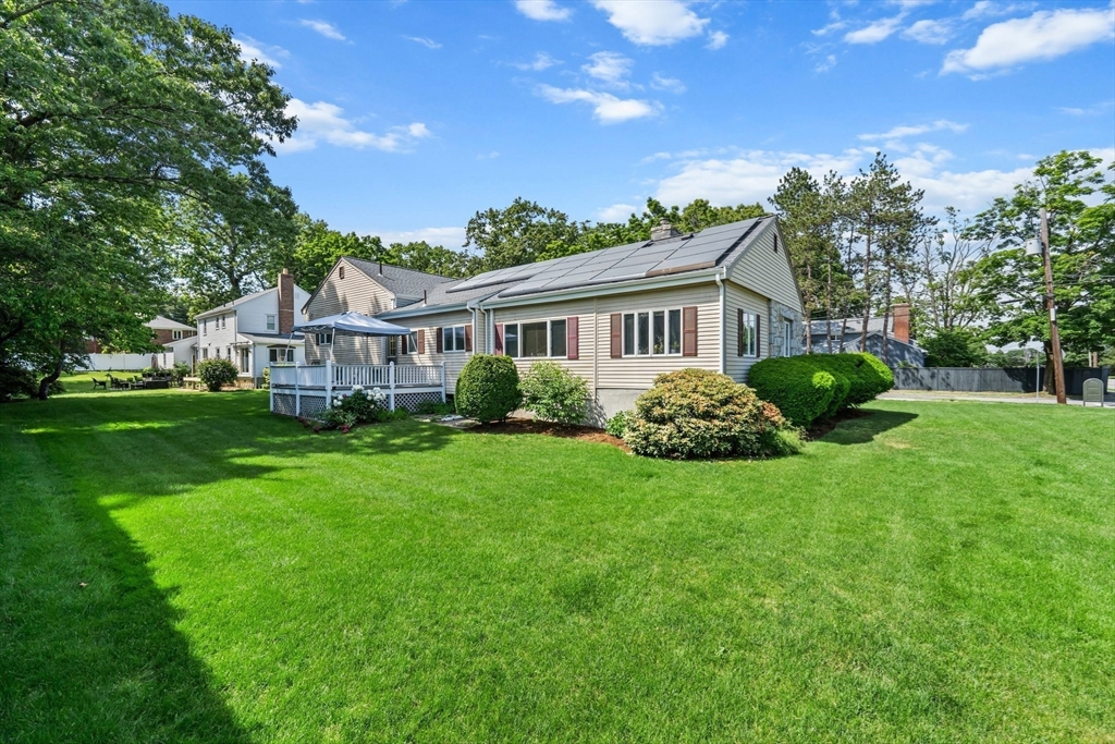 8 Mary Mt Road Auburndale, MA 02466 - Photo 3 of 36 a house with green field in front of it