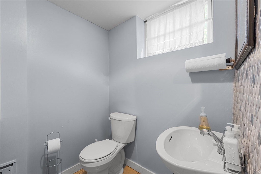 8 Mary Mt Road Auburndale, MA 02466 - Photo 33 of 36 a white toilet sitting next to a bathroom sink