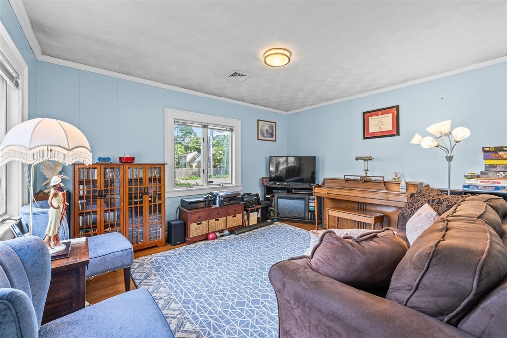 8 Mary Mt Road Auburndale, MA 02466 - Photo 10 of 36 a living room with furniture a rug and a window