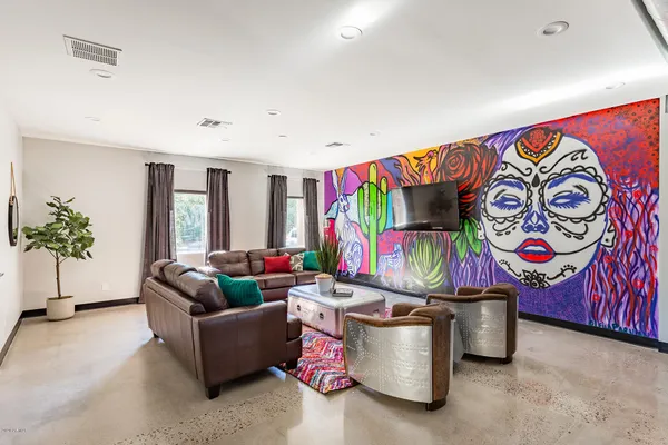 a living room with a couch and a couch