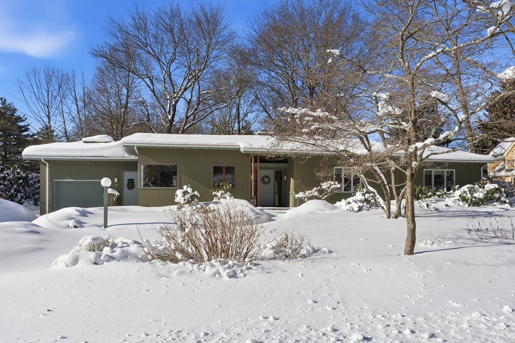 17 North Street Lexington, MA 02420 - Photo 2 of 42 a view of a house with a yard covered in snow