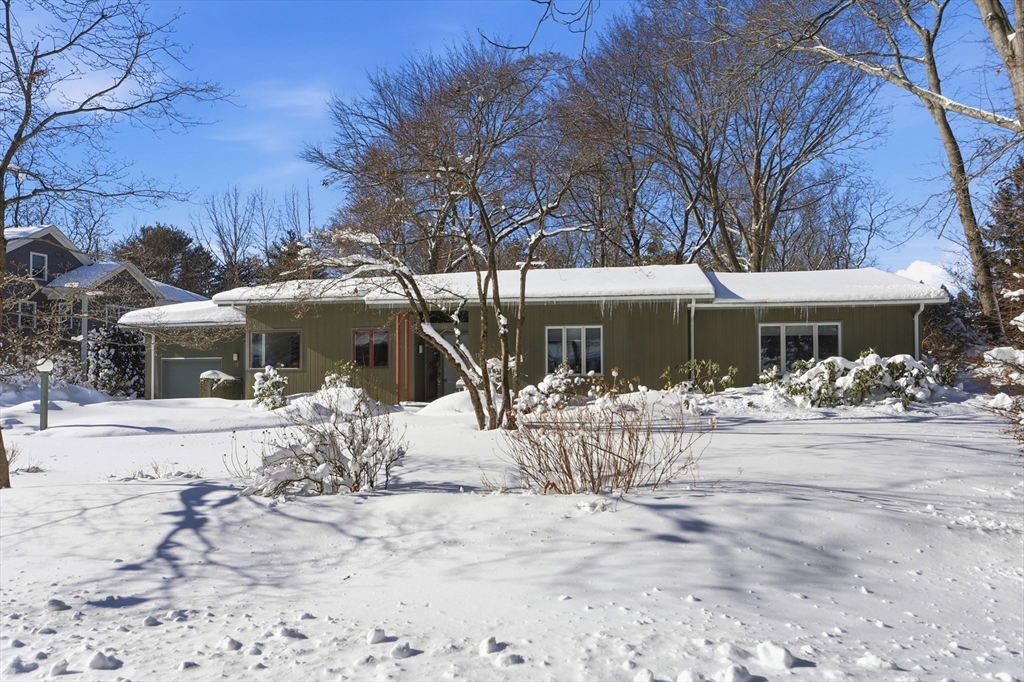 17 North Street Lexington, MA 02420 - Photo 34 of 42 a view of a house with a yard and covered with snow